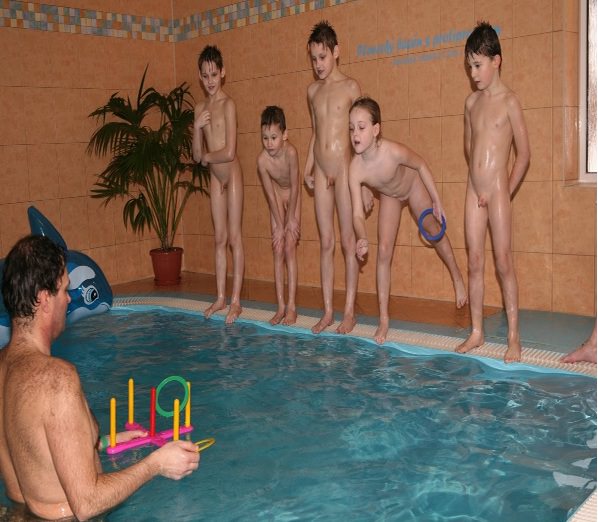 Naked nudists play in the pool Naked nudists play in the pool