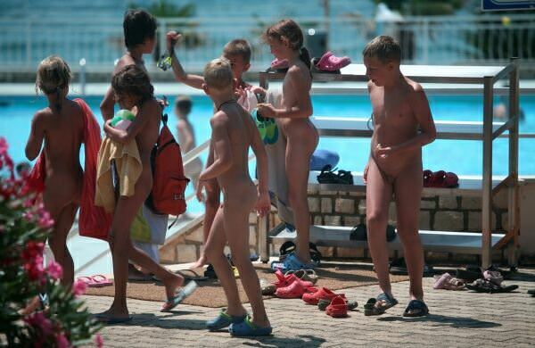 Family nudism in the aquapark territory Family nudism in the aquapark territory